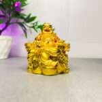 SAJAWATI Global On Chair With Ingot And Money Coin Laughing Buddha For Health Decorative Showpiece - 8 cm (Polyresin, Gold)